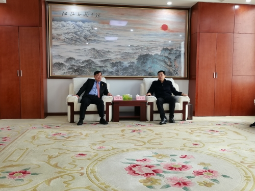 中共梁山县委书记谷永强接待福建匹克集团董事长许景南一行